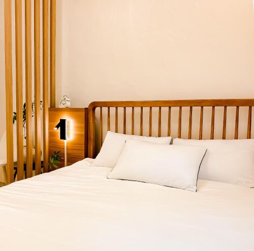 Postel nebo postele na pokoji v ubytování 스테이 하나 용산