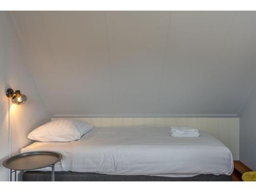 Postel nebo postele na pokoji v ubytování Lovely Holiday Home in Texel near Sea