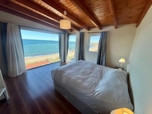 En eller flere senge i et værelse på Casa Costa de Mar