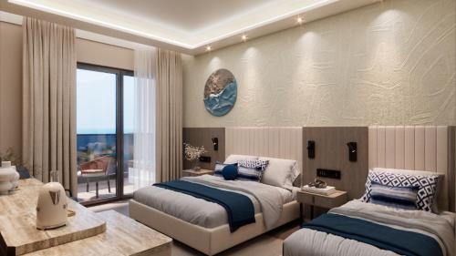 Postel nebo postele na pokoji v ubytování Çenger Blue Collection