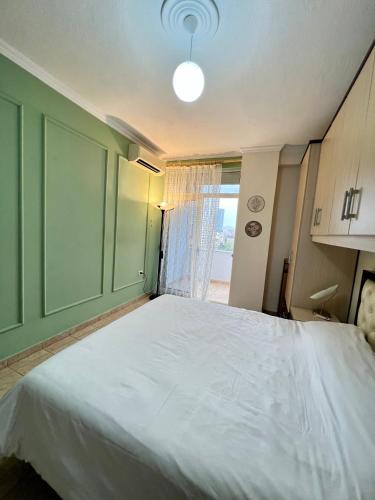 Llit o llits en una habitació de AS Apartment