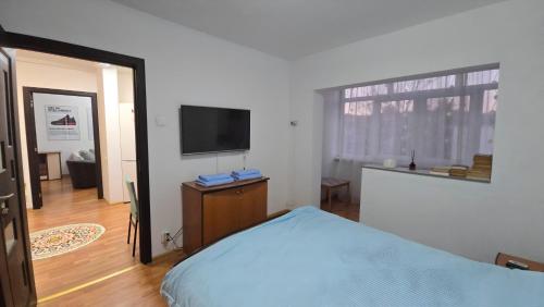 Ένα ή περισσότερα κρεβάτια σε δωμάτιο στο Opio's House