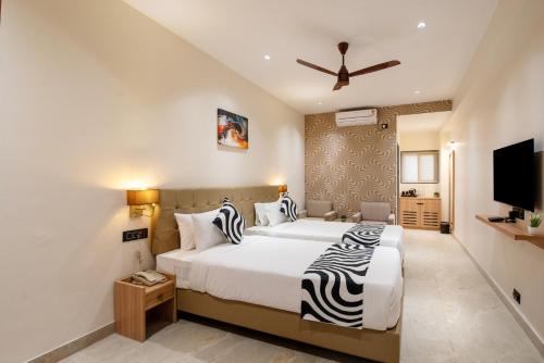 Voodi või voodid majutusasutuse Palette Hotel Pune, MIDC Chinchwad toas