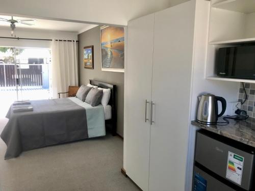 Ένα ή περισσότερα κρεβάτια σε δωμάτιο στο Sleep-on-Lily Guesthouse