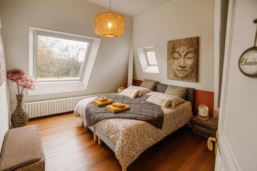 Postel nebo postele na pokoji v ubytování Maunoury Citybreak