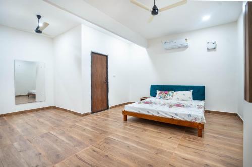 Postel nebo postele na pokoji v ubytování Advaya farm resort