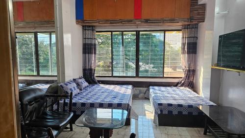 Ένα ή περισσότερα κρεβάτια σε δωμάτιο στο Sky Garden Home