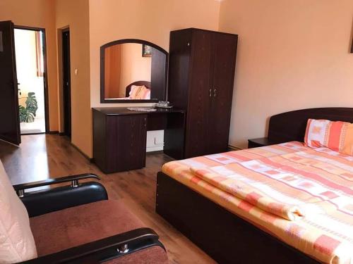 Postel nebo postele na pokoji v ubytování Pensiunea Roma MD