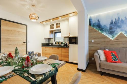 Köök või kööginurk majutusasutuses Słoneczne Chatki