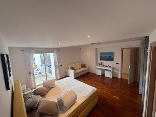 En eller flere senge i et værelse på Casa Estrella