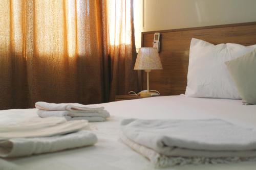 Ένα ή περισσότερα κρεβάτια σε δωμάτιο στο Karhal Room