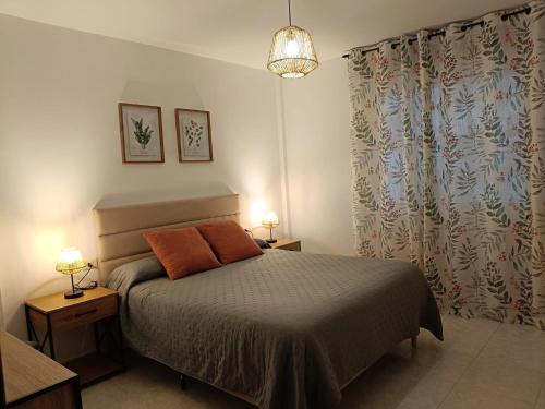 Postel nebo postele na pokoji v ubytování Casa Mugardos