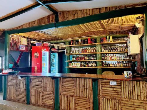 Ο χώρος του lounge ή του μπαρ στο Tunda Paradise Motel & Gardens