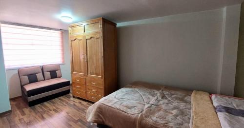 Ένα ή περισσότερα κρεβάτια σε δωμάτιο στο Sumaq Samay