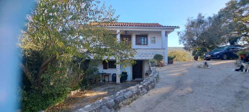 a house on the side of a road at Casa Clementina Guest house