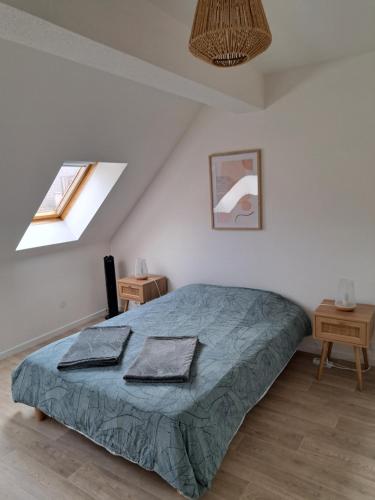 Ένα ή περισσότερα κρεβάτια σε δωμάτιο στο Chez Vincent - Centre Historique de Colmar avec parking inclus