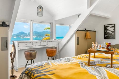 Ένα ή περισσότερα κρεβάτια σε δωμάτιο στο Mimosa