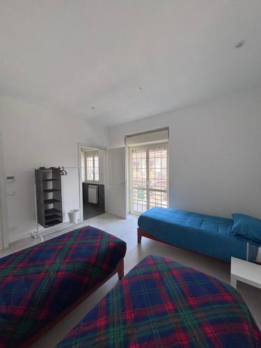 Ένα ή περισσότερα κρεβάτια σε δωμάτιο στο Anima Domus