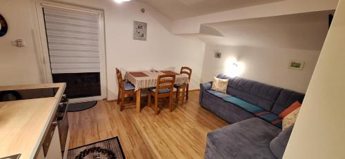 Et opholdsområde på Sonniges Appartement und Gästezimmer, Haus Borowiec