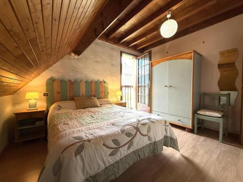 Ένα ή περισσότερα κρεβάτια σε δωμάτιο στο Le cailhabas