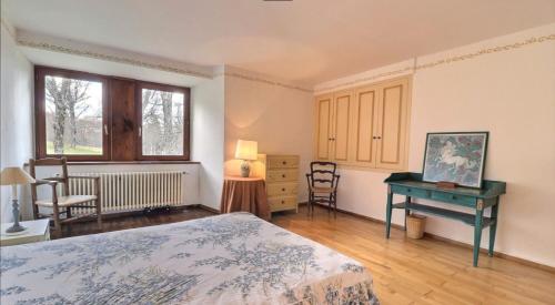 Postel nebo postele na pokoji v ubytování Gîte de La Chareyre