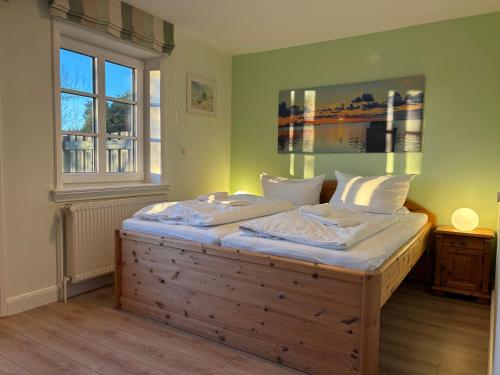 Postel nebo postele na pokoji v ubytování Austernfischer