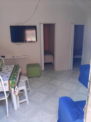 TV a/nebo společenská místnost v ubytování Casa para temporada