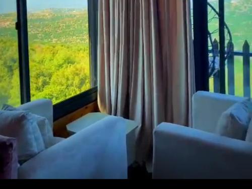 Χώρος καθιστικού στο أكواخ الهدهد