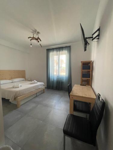 Giường trong phòng chung tại B&B Dai Nonni