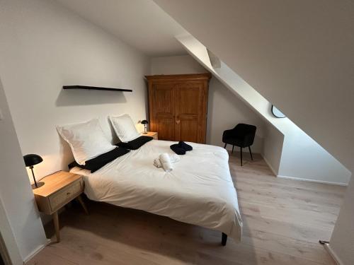Postel nebo postele na pokoji v ubytování Chez Cécile, appartement 4 personnes Alsace Vignoble