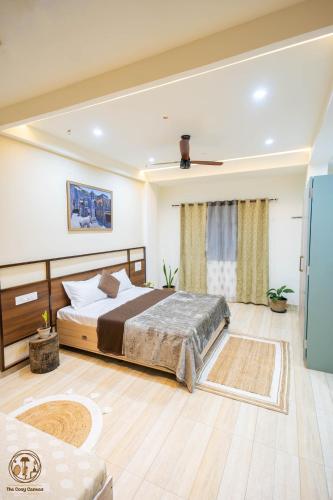 a bedroom with a large bed in a room at Desai Home Stay in Kolhapur