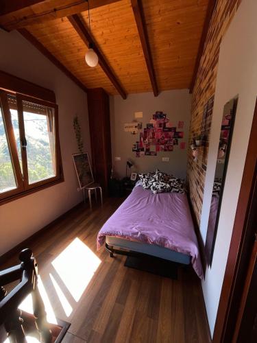 Postel nebo postele na pokoji v ubytování Casa Rural en la montaña