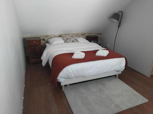 Postel nebo postele na pokoji v ubytování Gîte familial le Puy des Druides