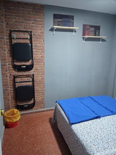 Postel nebo postele na pokoji v ubytování Nueva 5