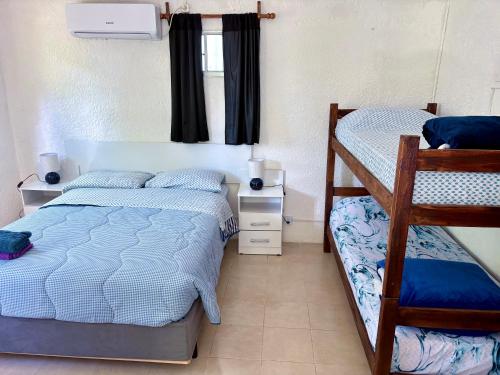 Ένα ή περισσότερα κρεβάτια σε δωμάτιο στο Il Mare Blu - Monoambiente completo