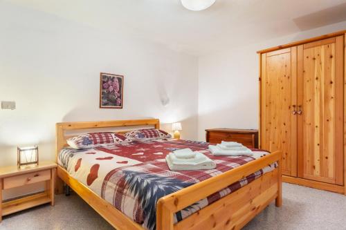 Voodi või voodid majutusasutuse Chalet Mazod, a 5 minuti dagli impianti di sci - Free Wifi toas