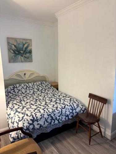 Ένα ή περισσότερα κρεβάτια σε δωμάτιο στο EN SUITE NEXT TO FELLS POINT