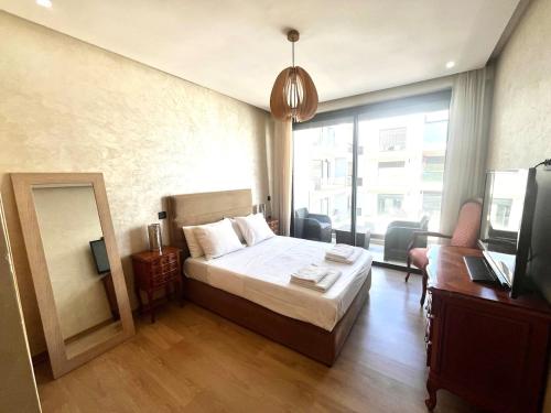 Ένα ή περισσότερα κρεβάτια σε δωμάτιο στο Agadir Bay 2 Bedroom Apt, Wi-Fi, 900m to Beach, Pool