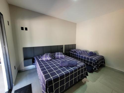 Voodi või voodid majutusasutuse Chacara Premium toas