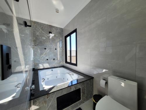 Vannituba majutusasutuses Chacara Premium