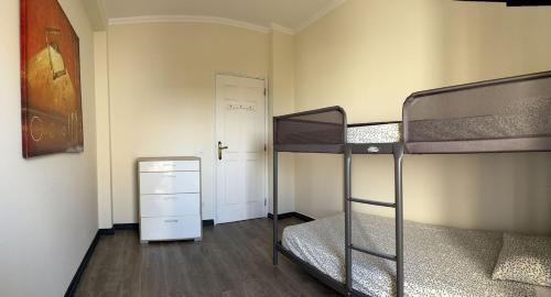 Postel nebo postele na pokoji v ubytování Fabulous Praia dos Pescadores