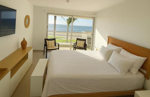 Postel nebo postele na pokoji v ubytování OCEAN VIEW APARMENT PARACAS - Primera fila