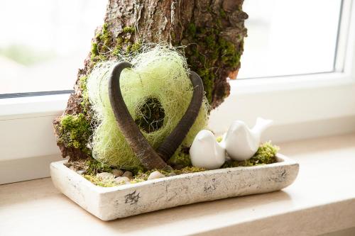 a succulent garden with a heart and two eggs at Urlaubsland Sonnfeld in Flachau