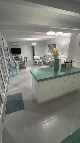 Η κουζίνα ή μικρή κουζίνα στο Casa Mazagón con vistas al mar