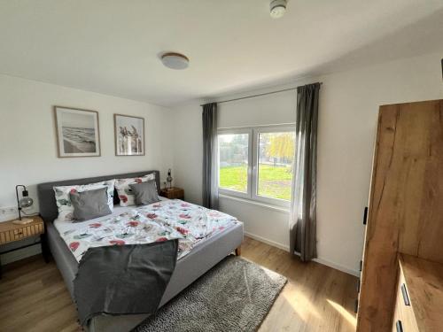 Postel nebo postele na pokoji v ubytování Idyllisches Feriendomizil