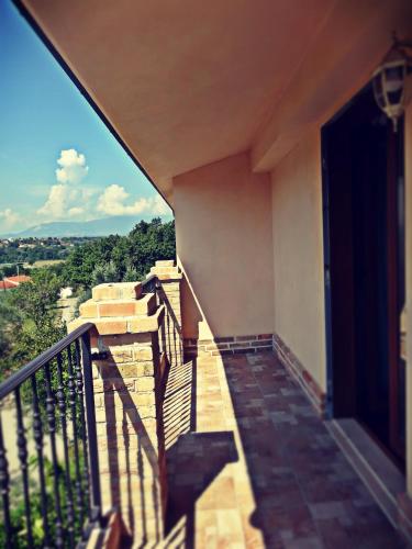 a balcony of a house with a view at Casale del Sole in Cepagatti