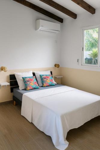 Ένα ή περισσότερα κρεβάτια σε δωμάτιο στο Fleur de Lys 2