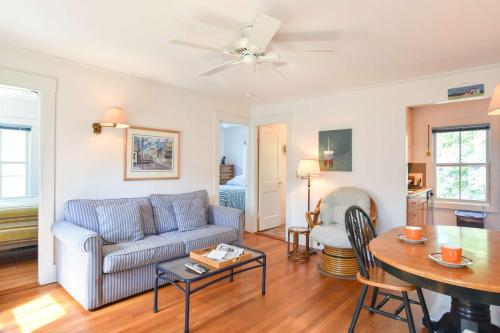 a living room with a couch and a table at Community beach and sundeck in Provincetown