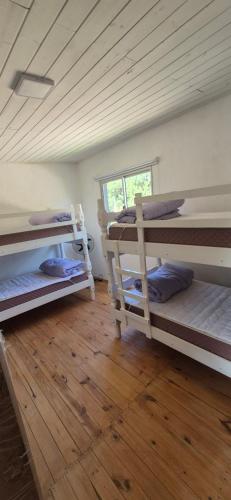 Postel nebo postele na pokoji v ubytování Cabañas del Sol