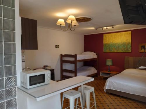 Ένα ή περισσότερα κρεβάτια σε δωμάτιο στο Sol